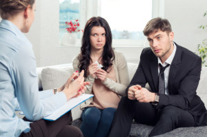 Young couple with a problem to consult a psychologist